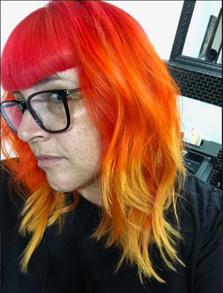 Red-to-orange-to-yellow melt with a blunt fringe
