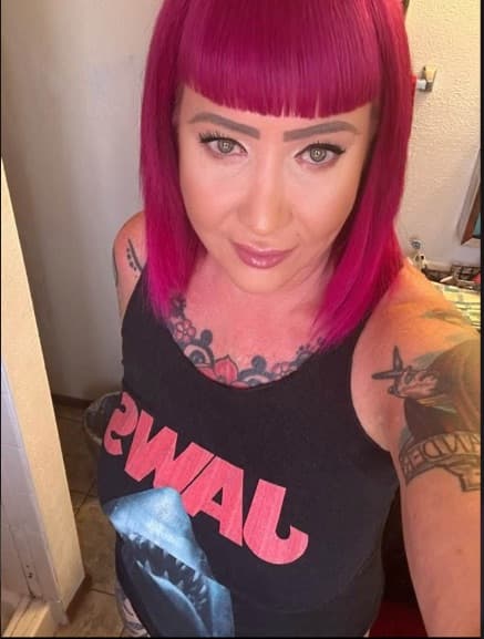 Electric magenta blunt bob and bangs