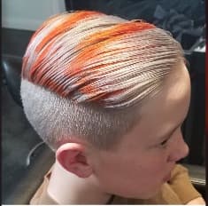 Platinum crop with orange stripes, slicked back
