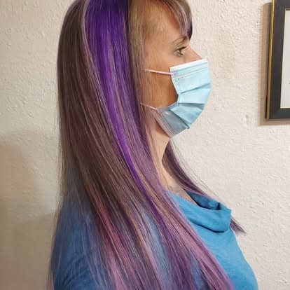 Neon orange into deep purple, straight with a blunt fringe