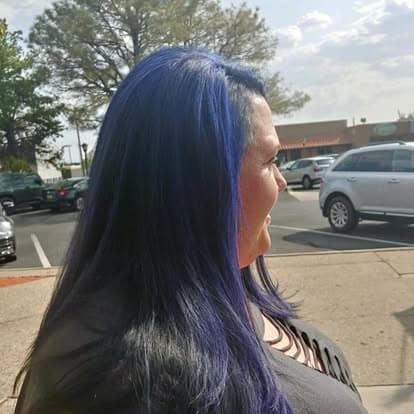 Long cobalt blue hair in daylight
